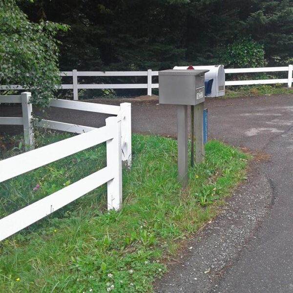 2 rail horse fence near mailboxes