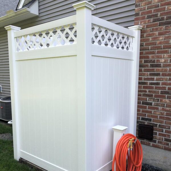 Canterbury white vinyl privacy fence small area