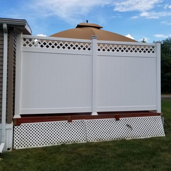 Canterbury white vinyl privacy fence on elevated deck