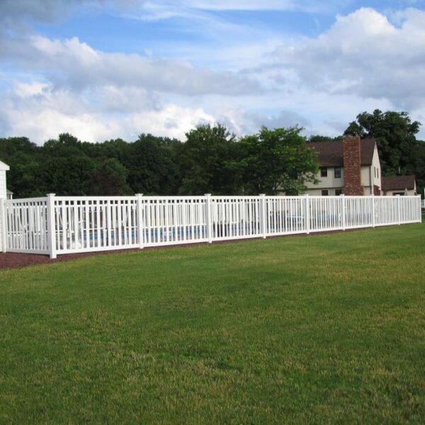 Cargill white vinyl pool fence on green lawn