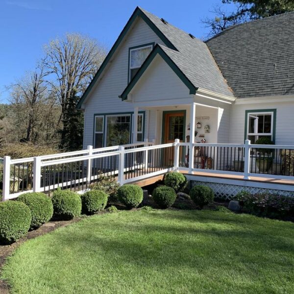 Bradford White vinyl railing on a slope