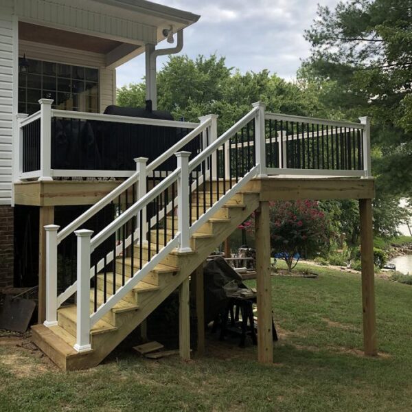 Bradford White vinyl railing tall stairs