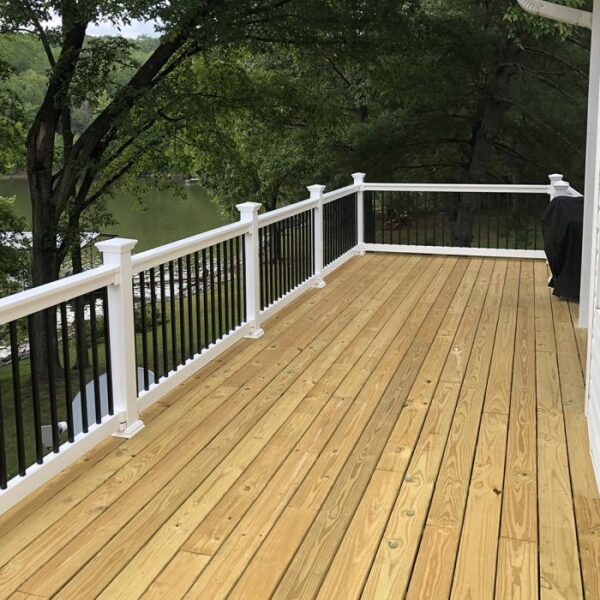 Bradford White vinyl railing on deck overlooking pond