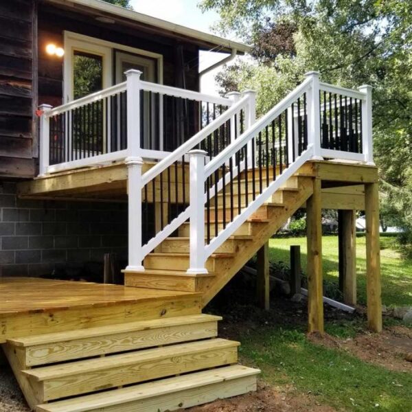 Bradford White vinyl railing on pine porch with stairs