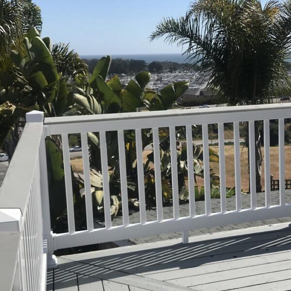 Bexley white vinyl railing near palm trees