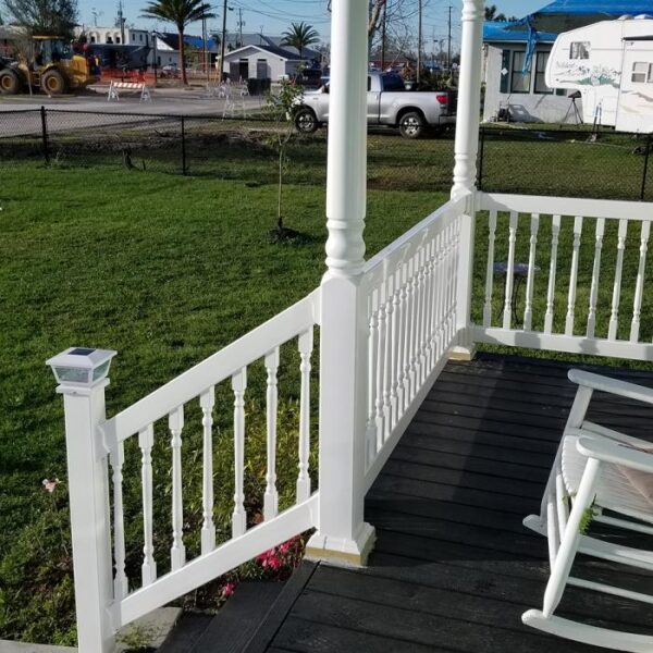 Westport white vinyl railing with LED post cap