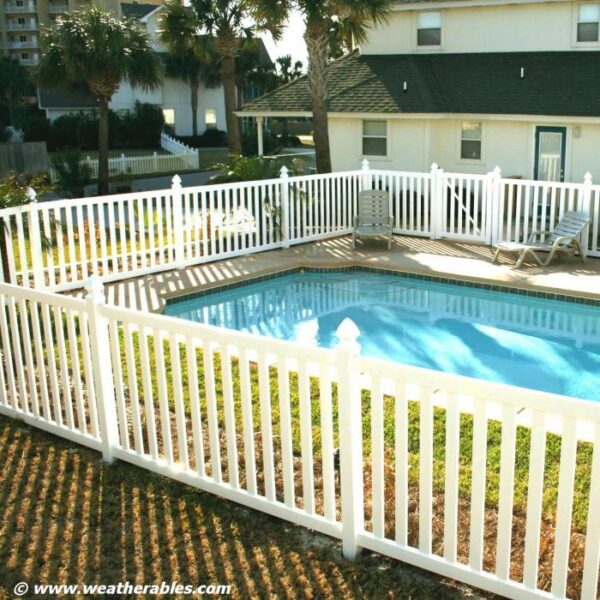 Waldston white vinyl pool fence around pool side view