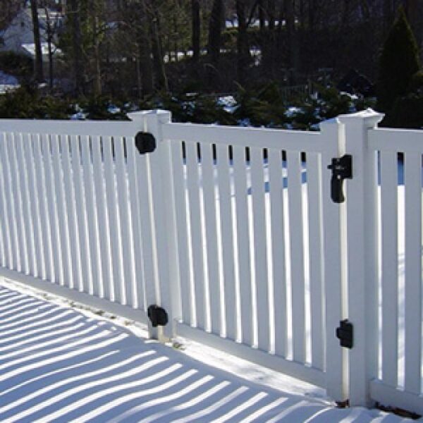 Stanton white vinyl pool fence in the snow