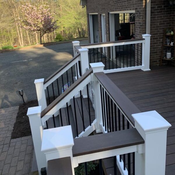 Warrington white vinyl railing near driveway