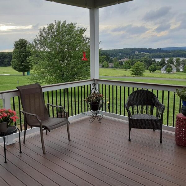 Warrington white vinyl railing on decorated porch