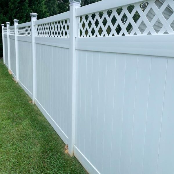 Winchester white vinyl privacy fence long view