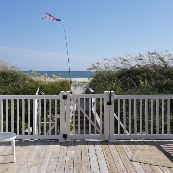 Waltham white vinyl railing on the beach