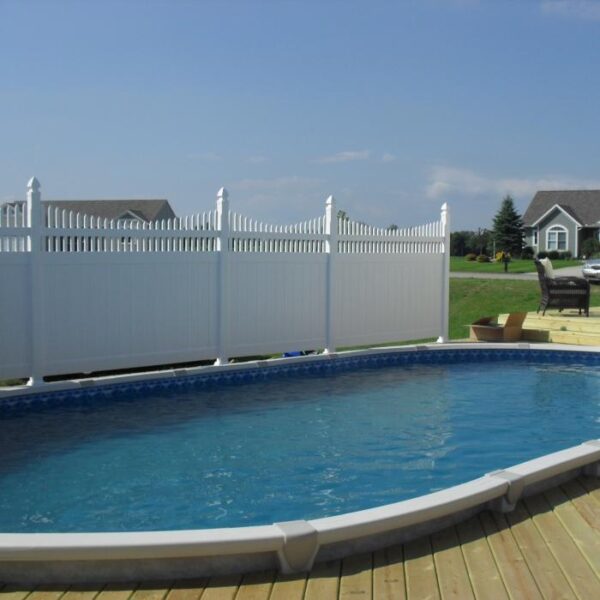 Turnbridge white vinyl privacy fence near pool