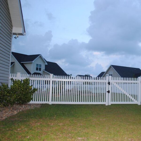 Durham white vinyl picket fence evening light