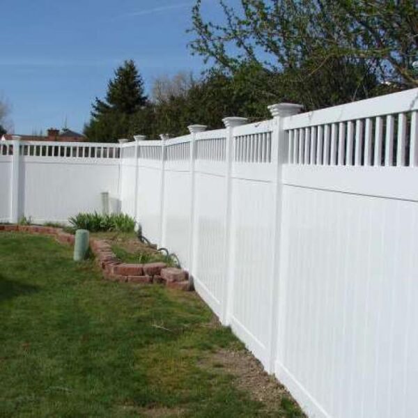 Portsmouth white vinyl privacy fence long view