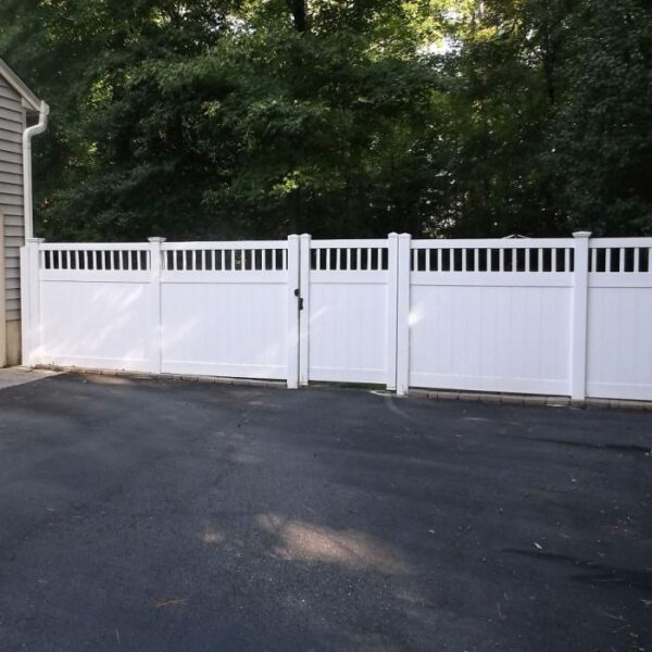 Portsmouth white vinyl privacy fence gate in driveway