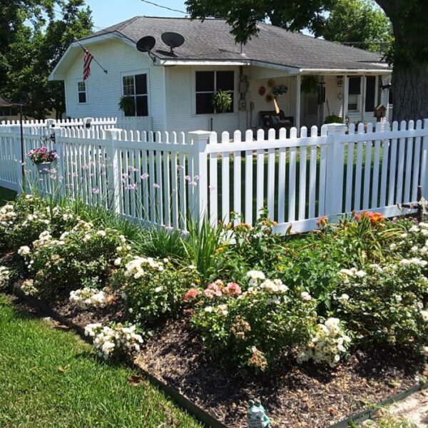 Burton white vinyl picket fence with garden alternate view