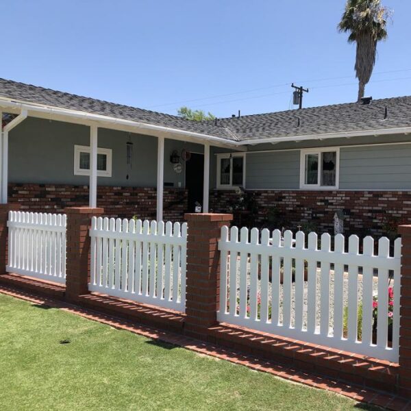 Sudbury white vinyl picket fence around garden alternate view