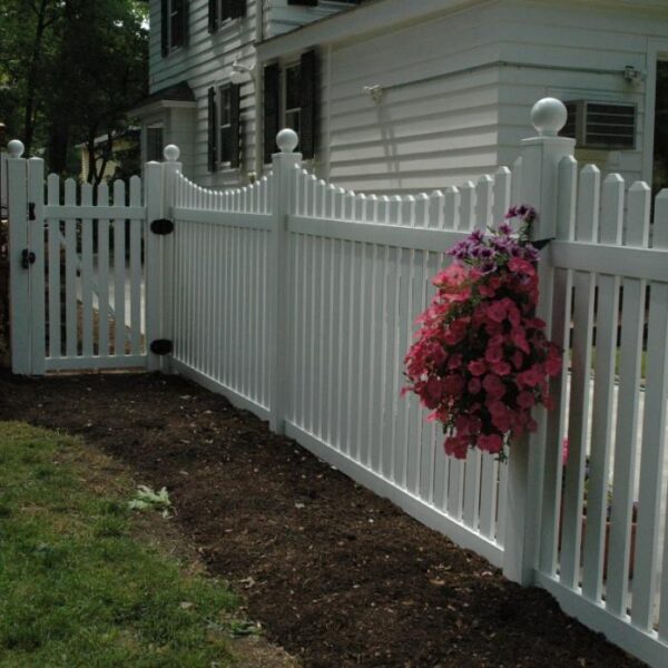 Rochdale white vinyl picket fence with hanging flowers