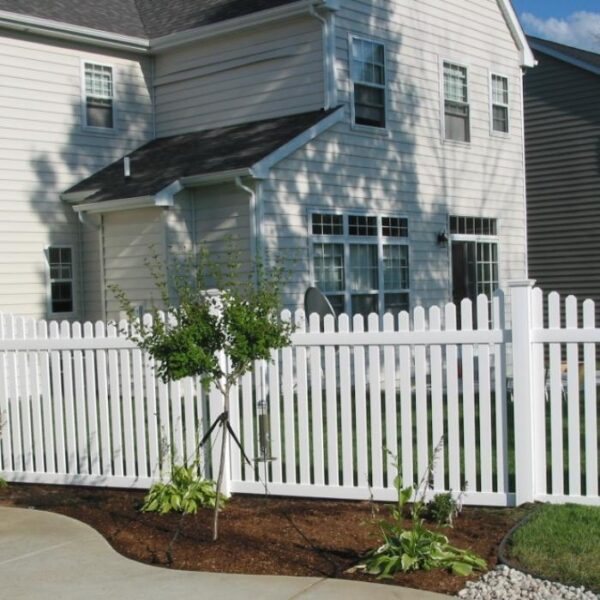 Rochdale white vinyl picket fence around house