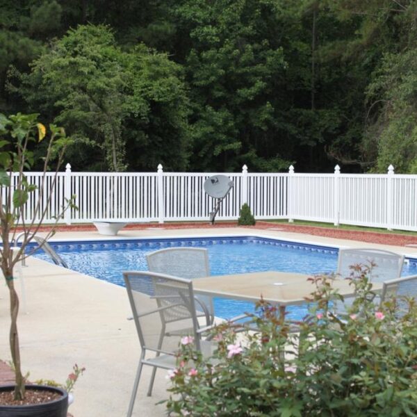 Austell white pool fence behind satellite dish