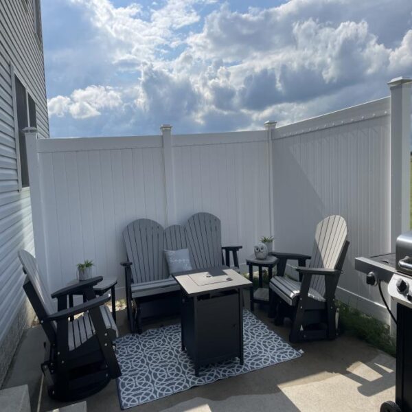 Ashforth white vinyl privacy fence patio corner