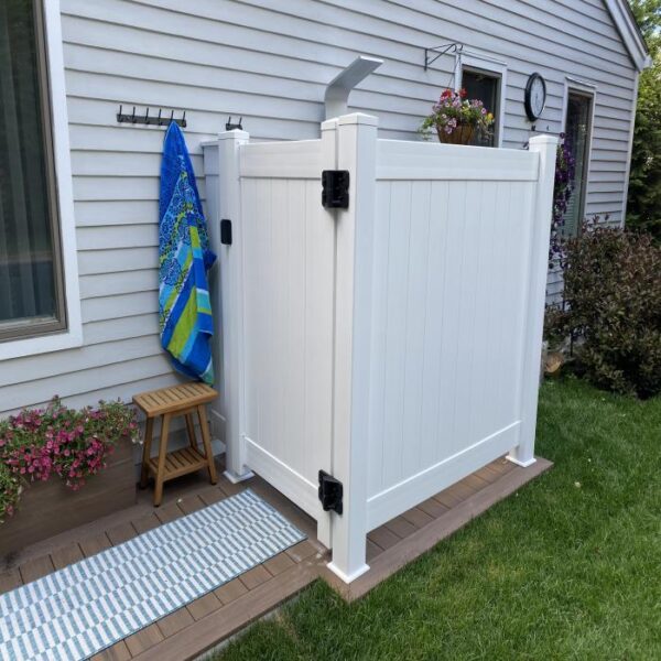 Ashforth white vinyl privacy fence shower area