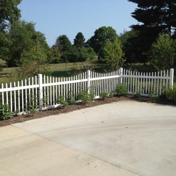 Stanley white vinyl picket fence around driveway