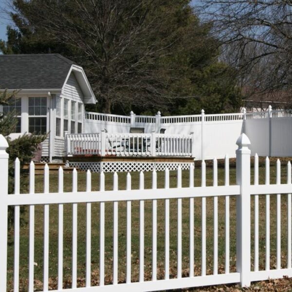 Stanley white vinyl picket fence around yard closer view