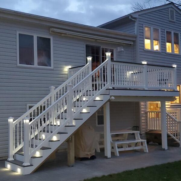 Hastings white vinyl railing on tall stairs