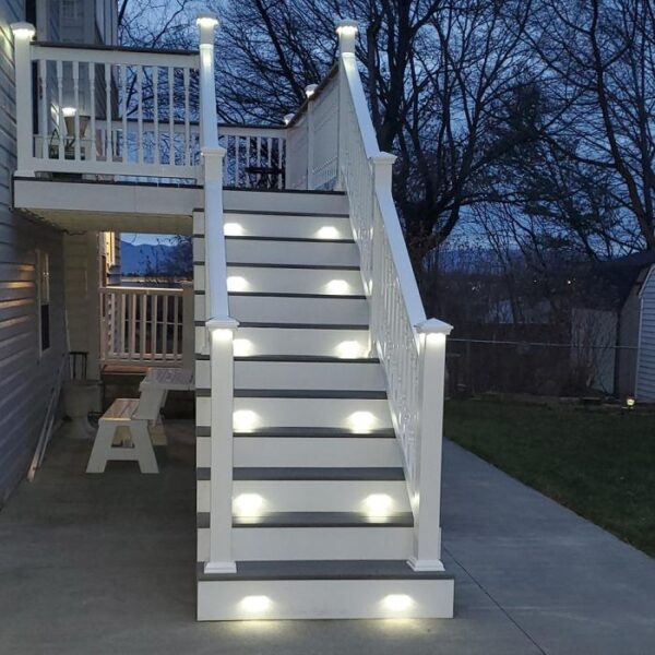 Hastings white vinyl railing with stair lights