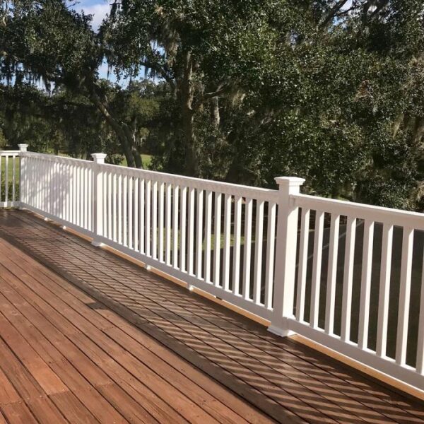 Harrington White vinyl railing on brown deck