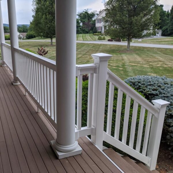 Harrington White vinyl railing with stair panel
