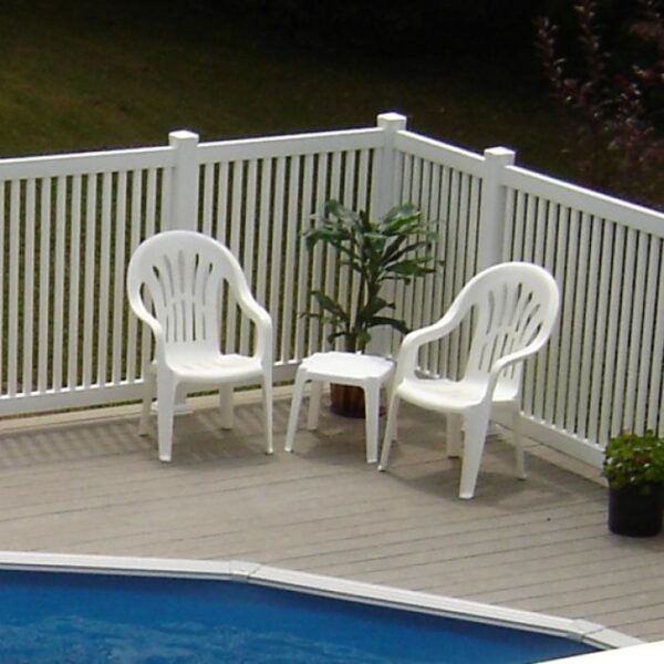 Harwich white vinyl pool fence with pool chairs