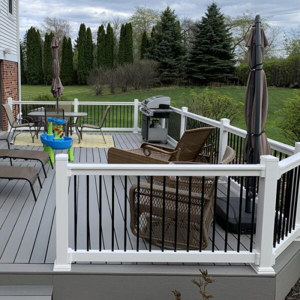 Kirklees White vinyl railing on busy porch