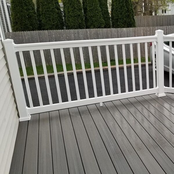 Brighton white vinyl railing on grey porch