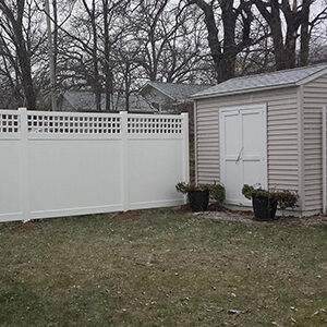 Cyrus white vinyl privacy fence with shed