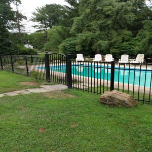 Aluminum fencing with gate near pool